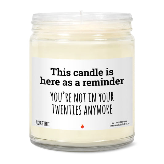 Candle that says you're not in your twenties anymore. Shows candle without lid
