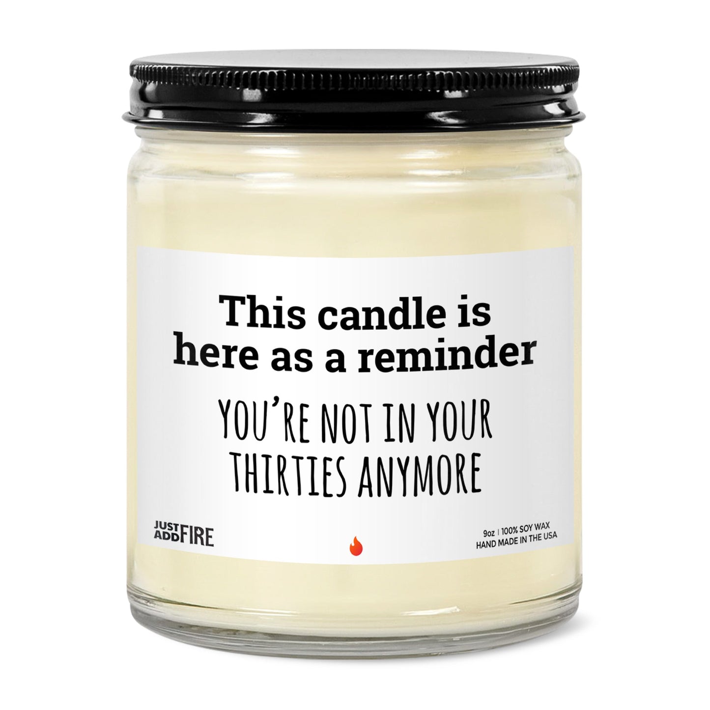 Candle that says you're not in your thirties anymore – lit front