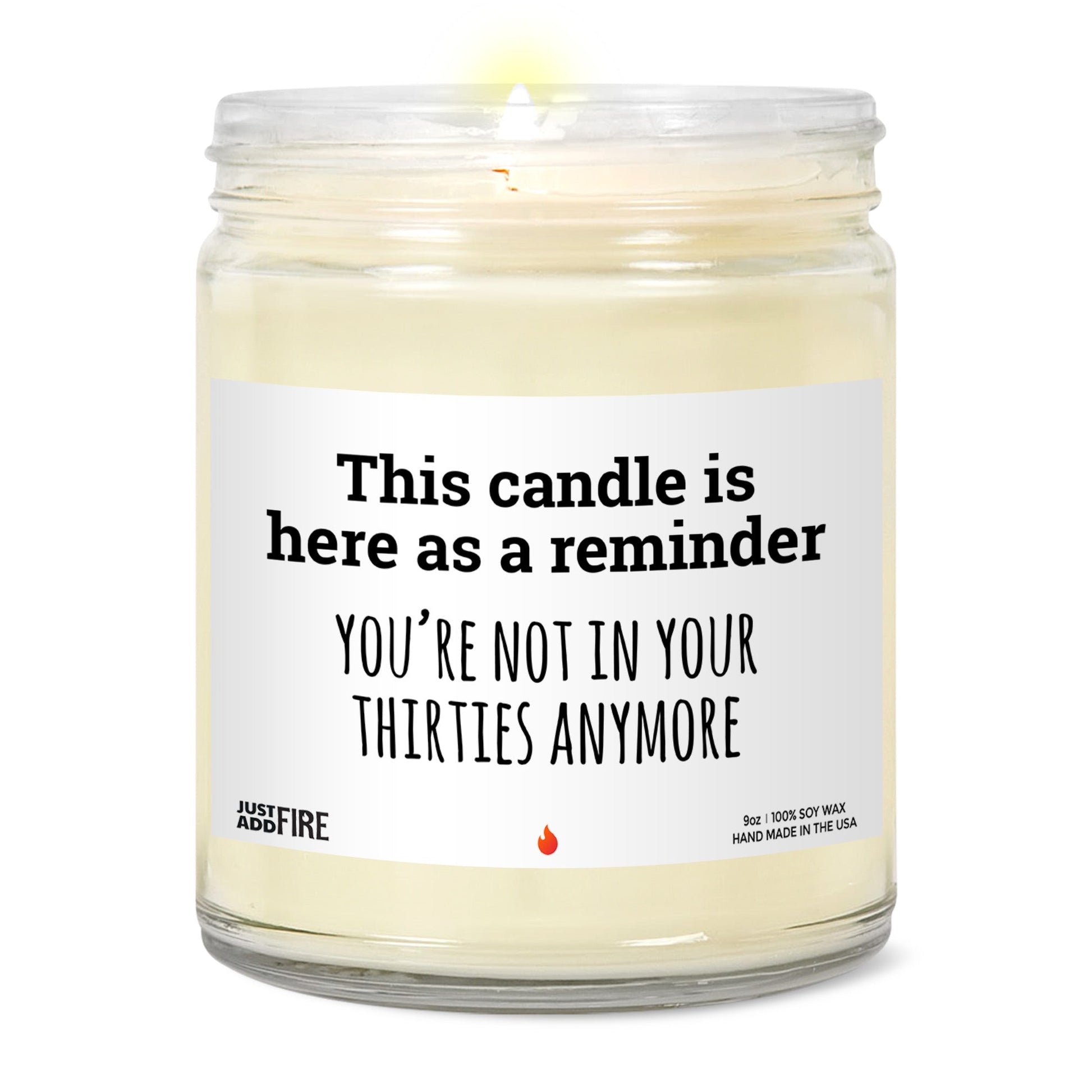 Candle that says you're not in your thirties anymore – lit front