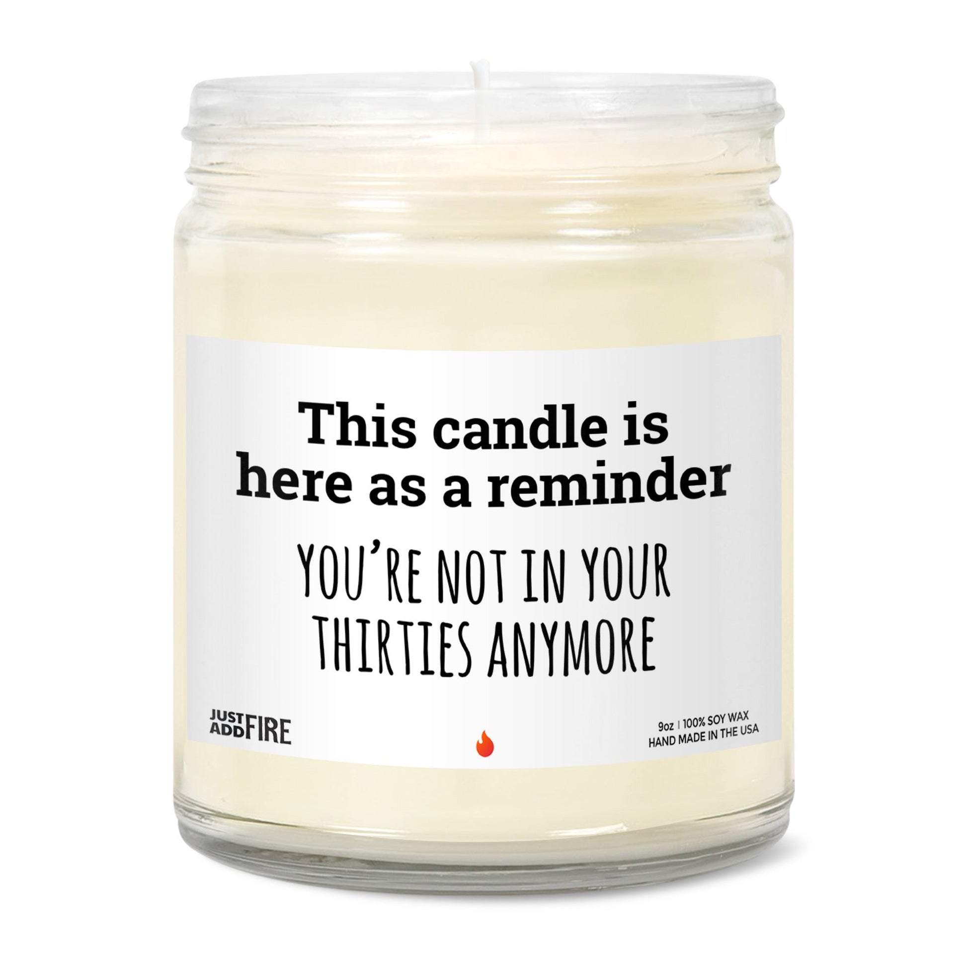 Candle that says you're not in your thirties anymore – lit front
