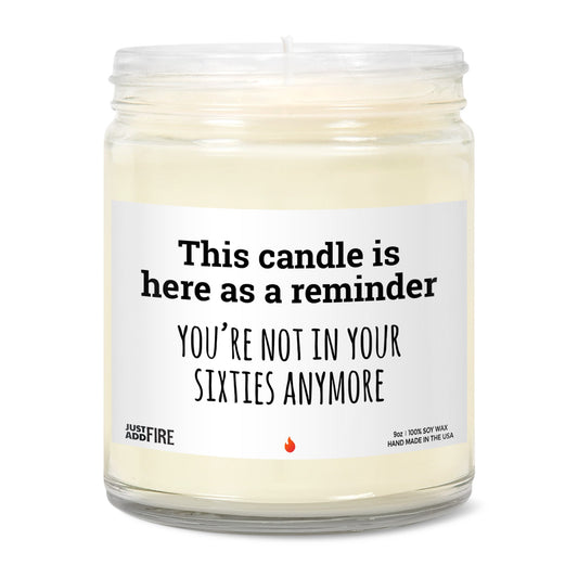 Candle that says you're not in your Sixties anymore – lit front